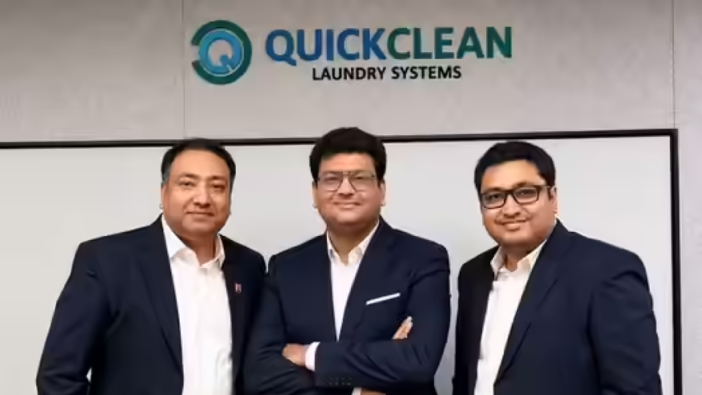 Quick Clean commercial laundry facility processing institutional linens using automated equipment.